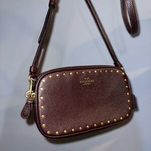 Coach Sadie Border Rivets Crossbody in Pebble
Leather F31785